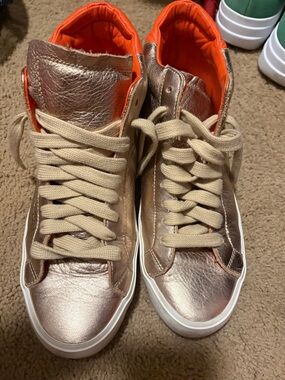 Tory Burch gold high tops size 10